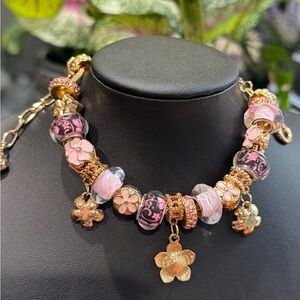Pink Charms Gold-Toned Bracelet